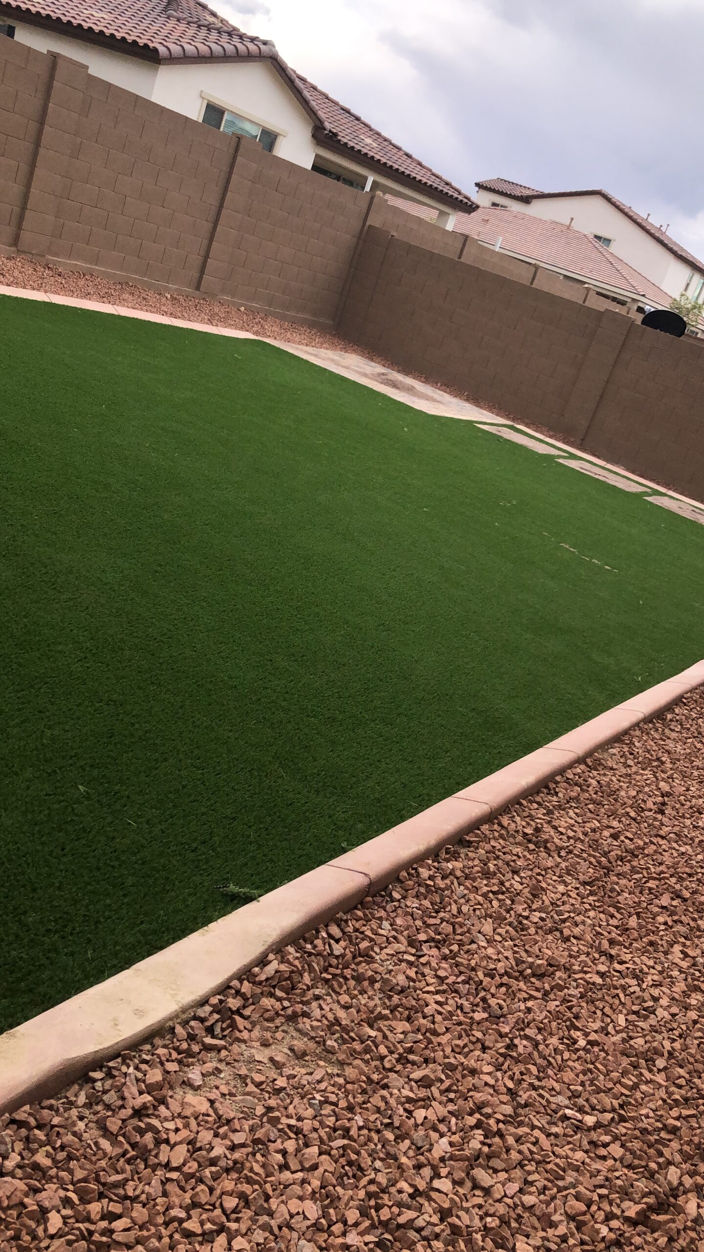 artificial grass with concrete curbing