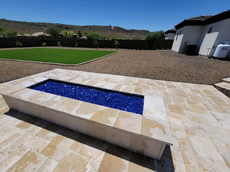 Artificial grass with blue fireplace