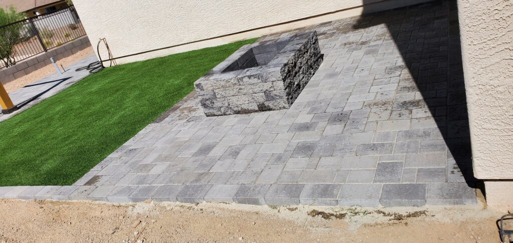 Artificial Grass Masters installs fire pit made out of Catalina rio pavers