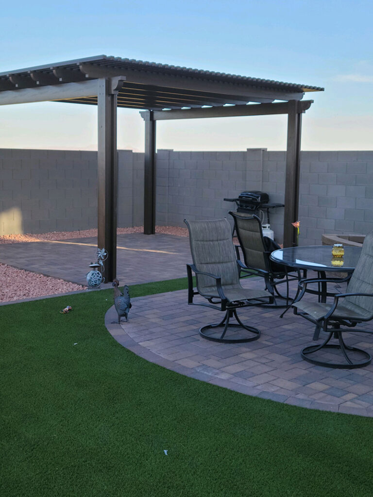 backyards pergola and paver pads with curbing and artificial turf