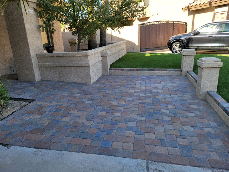 front yard paver patio lounge area