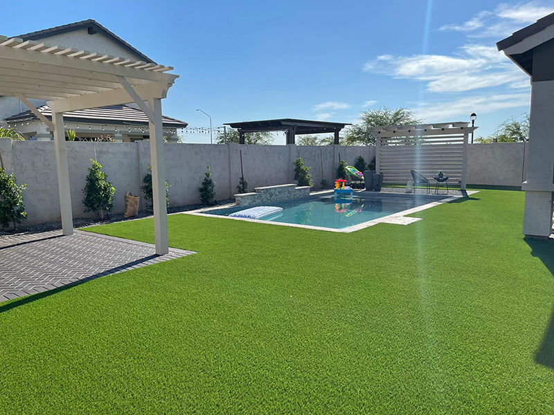 large backyard artificial grass and pergola install