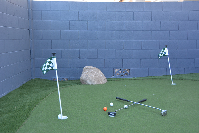 Putting green on the side of the home in Surprise Arizona