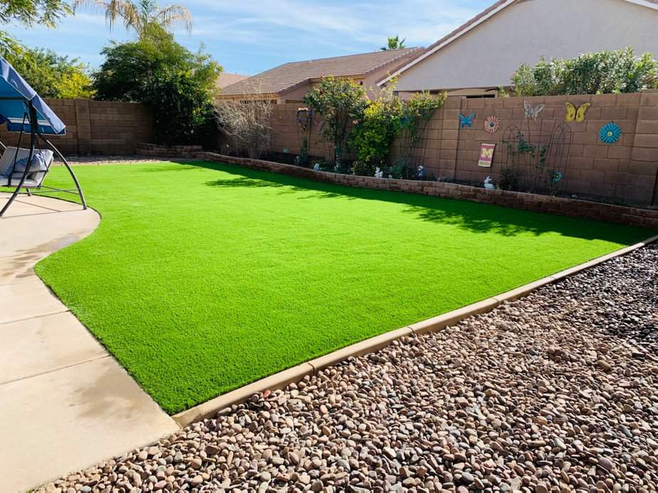 backyard artificial grass with mowers edge curbing